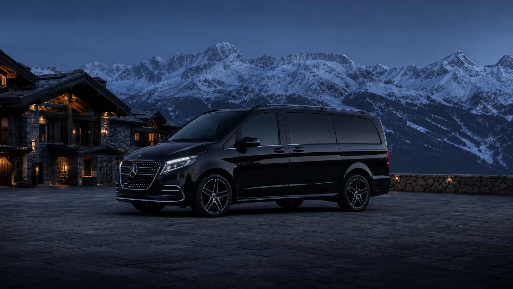 Mercedes Classe V noir, grand van privé, au pied des Alpes.